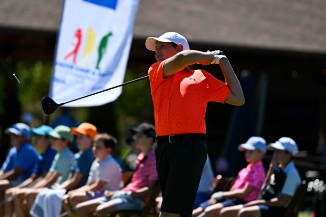 Kid playing golf