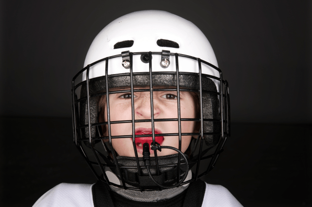 Hockey player with mouth guard