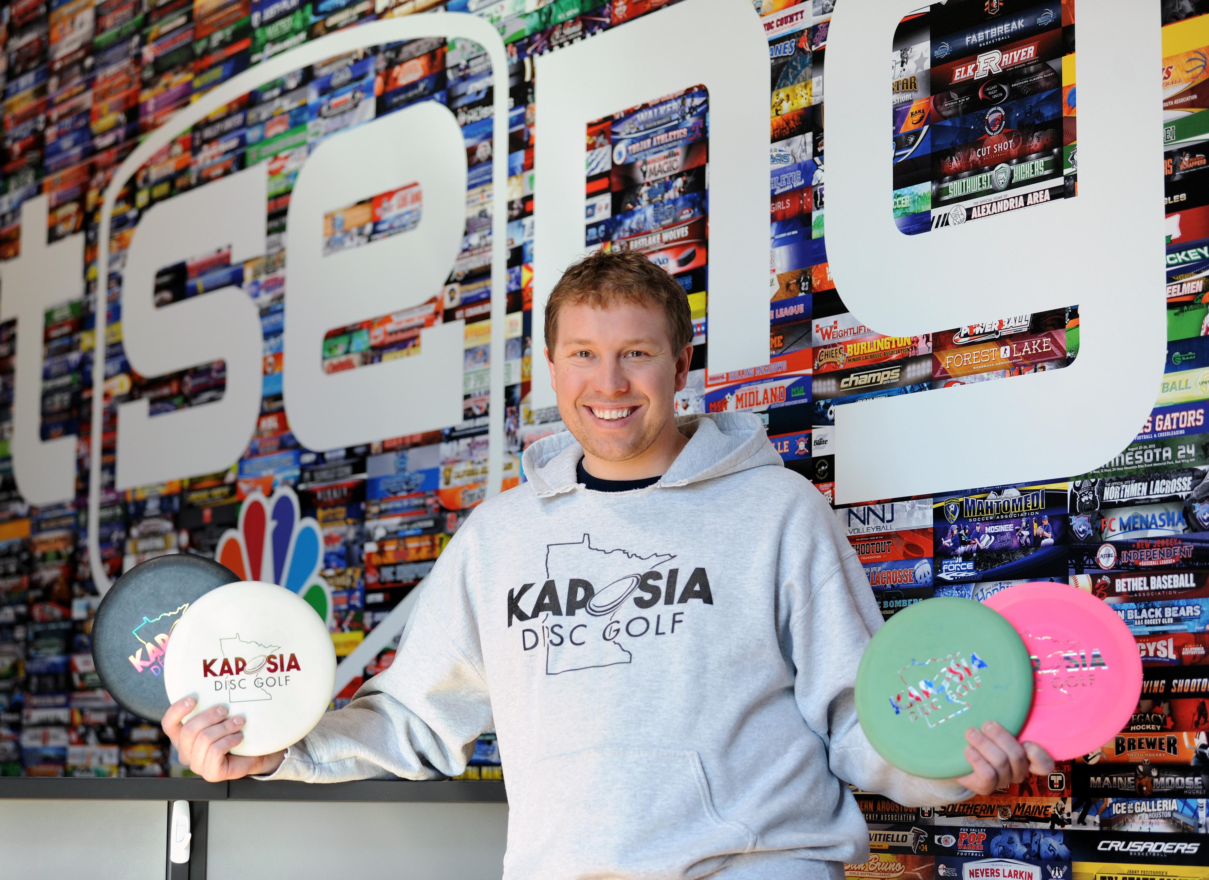 Phil Loprinzi with discs for disc golf