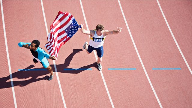 Track athlete with USA flag.