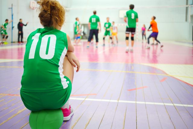 Volleyball player's back