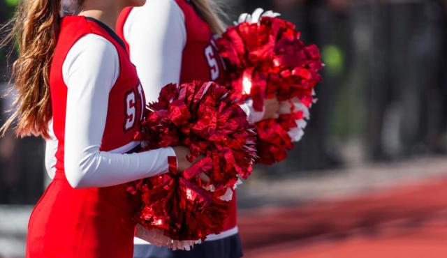 Two high school cheerleaders