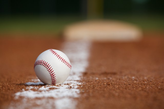 Baseball on the Infield Chalk Line with the Base in the distance