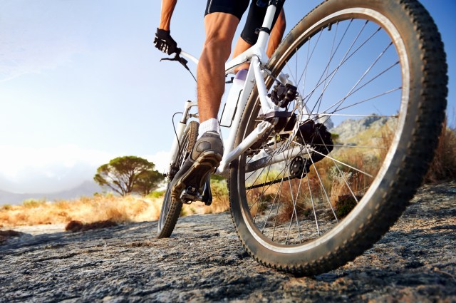 Extreme mountain bike sport athlete man riding outdoors lifestyle trail