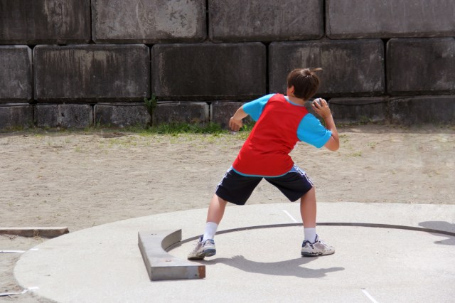 Boy on track and field competition