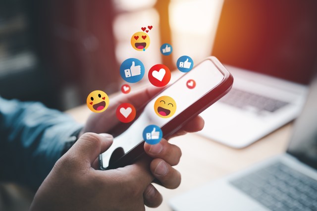 Social media and digital online concept, man using smart phone with Social media