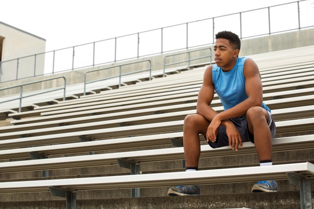 Young African American teenager contemplating his future.