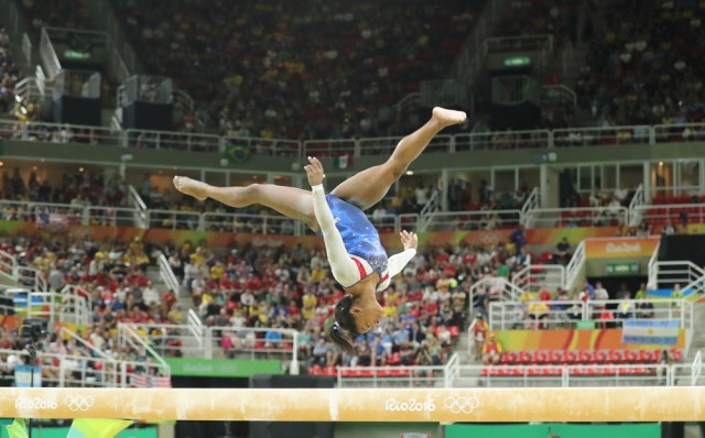 Olympic champion Simone Biles of United States competing on the balance beam at women's all-around gymnastics at Rio 2016 Olympic Games.