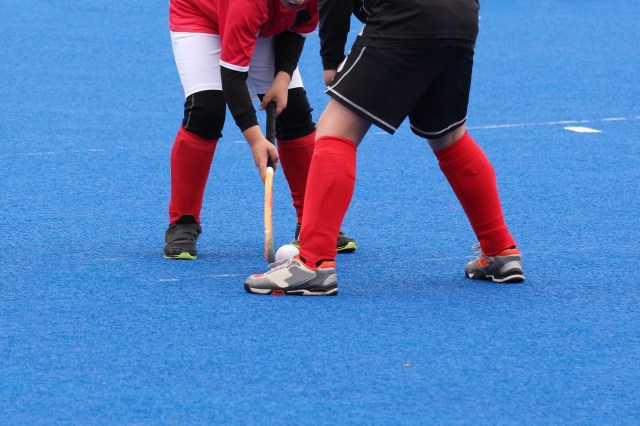 Two boys ready for field hockey