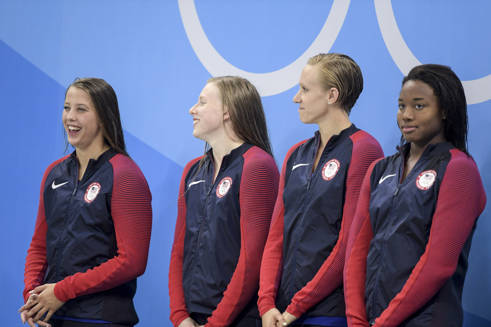 Gold medalist Kathleen Baker, Lilly King, Dana Vollmer and Simone Manuel (USA) during Women's 4 Ã? 100m medley relay of the Rio 2016 Olympics Games